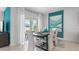 Dining area with sliding glass doors and modern dining set at 4141 Giorgio Dr, Winter Haven, FL 33884