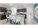 Modern kitchen with stainless steel appliances and kitchen island at 4141 Giorgio Dr, Winter Haven, FL 33884