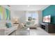 Spacious living room with two sofas, coffee table, and large windows at 4141 Giorgio Dr, Winter Haven, FL 33884
