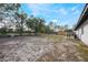 Spacious backyard with a patio and plenty of room to relax at 4856 Victory Dr, Orlando, FL 32808