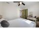 Bright bedroom with double bed and ceiling fan at 4856 Victory Dr, Orlando, FL 32808