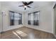 Spacious bedroom with hardwood floors and ceiling fan at 4856 Victory Dr, Orlando, FL 32808