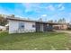Newly renovated home with gray and white exterior at 4856 Victory Dr, Orlando, FL 32808