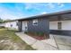 Newly renovated home's front entryway with landscaping at 4856 Victory Dr, Orlando, FL 32808