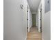 Clean hallway with light walls and new flooring at 4856 Victory Dr, Orlando, FL 32808
