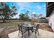 Enjoy outdoor dining on this patio, overlooking a spacious backyard at 4856 Victory Dr, Orlando, FL 32808