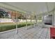 Relaxing screened porch with view of backyard at 5122 Lazy Oaks Dr # 5122, Winter Park, FL 32792