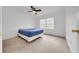 Bedroom with a full bed and ceiling fan at 600 Nicole Blvd, Ocoee, FL 34761