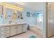 Clean bathroom with soaking tub and updated vanity at 6399 Lolly Bay Ne Loop, Winter Haven, FL 33881