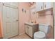 Simple bathroom with toilet and sink at 6399 Lolly Bay Ne Loop, Winter Haven, FL 33881