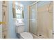 Bathroom with shower stall and toilet at 6399 Lolly Bay Ne Loop, Winter Haven, FL 33881