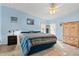Spacious bedroom with king-size bed and ensuite access at 6399 Lolly Bay Ne Loop, Winter Haven, FL 33881