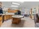 Open kitchen with an island, ample counter space and views into adjacent rooms at 6399 Lolly Bay Ne Loop, Winter Haven, FL 33881