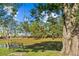 Serene pond with a bench, offering peaceful views at 6399 Lolly Bay Ne Loop, Winter Haven, FL 33881