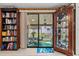 View of a relaxing screened porch with outdoor seating at 6399 Lolly Bay Ne Loop, Winter Haven, FL 33881