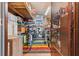 Storage room with shelving, great for bikes and tools at 6399 Lolly Bay Ne Loop, Winter Haven, FL 33881