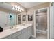 Double vanity bathroom with shower and a modern look at 7160 Oakmoss Loop Loop, Davenport, FL 33837