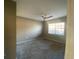 Bright bedroom with carpeted floor and large window at 2598 Robert Trent Jones Dr # 1010, Orlando, FL 32835