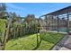 Grass backyard with swing set at 3875 Grassland Loop, Lake Mary, FL 32746