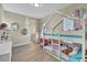 Bedroom with a house-shaped bunk bed and a built in desk at 3875 Grassland Loop, Lake Mary, FL 32746