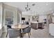 Bright breakfast nook with a round table and four chairs at 3875 Grassland Loop, Lake Mary, FL 32746