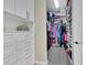 Organized walk-in closet with custom shelving at 3875 Grassland Loop, Lake Mary, FL 32746