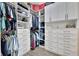 Large walk-in closet with ample shelving and hanging space at 3875 Grassland Loop, Lake Mary, FL 32746