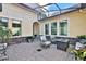 Outdoor seating area with fire pit and covered patio at 3875 Grassland Loop, Lake Mary, FL 32746