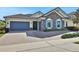 Beautiful stone and shingle exterior, two-car garage, and paved driveway at 3875 Grassland Loop, Lake Mary, FL 32746