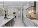 Spacious kitchen featuring modern appliances and a large island at 3875 Grassland Loop, Lake Mary, FL 32746