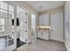Home office with French doors and built in cabinetry at 3875 Grassland Loop, Lake Mary, FL 32746