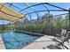 Relaxing screened pool with extended awning at 3875 Grassland Loop, Lake Mary, FL 32746