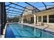 Long, refreshing pool with a screened enclosure at 3875 Grassland Loop, Lake Mary, FL 32746