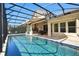 Relaxing screened pool with expansive backyard views at 3875 Grassland Loop, Lake Mary, FL 32746