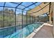 Refreshing screened pool perfect for relaxation at 3875 Grassland Loop, Lake Mary, FL 32746
