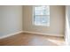 Bright bedroom with light walls and wood floors at 4837 Lorraine Way, Orlando, FL 32812