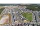 Aerial view of community with green spaces and homes at 6420 Sprucepine Ln, Saint Cloud, FL 34771