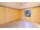 Spacious bedroom with tile floors and window at 79 Lake Villa Way, Kissimmee, FL 34743