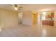 Bright living room with tile floors and access to kitchen at 79 Lake Villa Way, Kissimmee, FL 34743