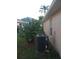 AC unit located in the backyard at 7947 Golden Pond Cir, Kissimmee, FL 34747