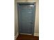 Private condo entry with a blue door and number 118 at 860 N Orange Ave # 118, Orlando, FL 32801
