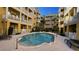 Inviting community pool with lounge chairs at 860 N Orange Ave # 118, Orlando, FL 32801