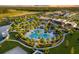 Aerial view of community pool and clubhouse at 8929 Amelia Downs Trl, Kissimmee, FL 34747