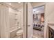 Clean bathroom with bathtub, shower, and vanity at 8929 Amelia Downs Trl, Kissimmee, FL 34747