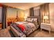 Bedroom with Eiffel Tower mural and red car bedding at 8929 Amelia Downs Trl, Kissimmee, FL 34747