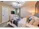 Bright bedroom with New York City themed bedding and TV at 8929 Amelia Downs Trl, Kissimmee, FL 34747