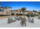 Evening view of fire pit with seating near clubhouse at 8929 Amelia Downs Trl, Kissimmee, FL 34747