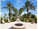 Relaxing fire pit area with seating at Solara Resort at 8929 Amelia Downs Trl, Kissimmee, FL 34747