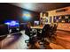 Game room with poker table, TV and music decor at 8929 Amelia Downs Trl, Kissimmee, FL 34747
