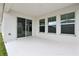 Covered patio with sliding glass doors at 1731 Durden Dr, Winter Haven, FL 33880